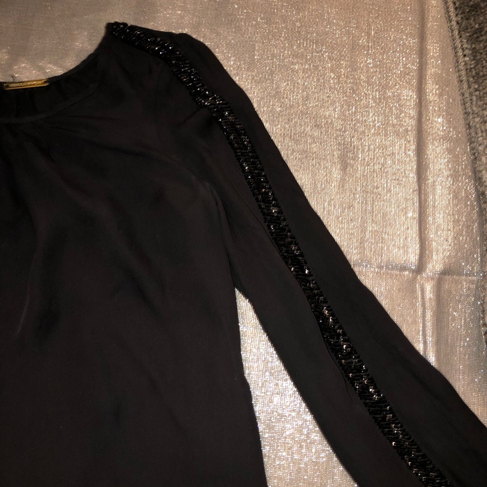 Silk blouse.